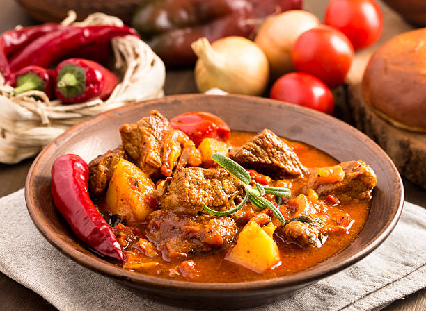 Goulash in ceramic plate. Traditional hungarian meal
