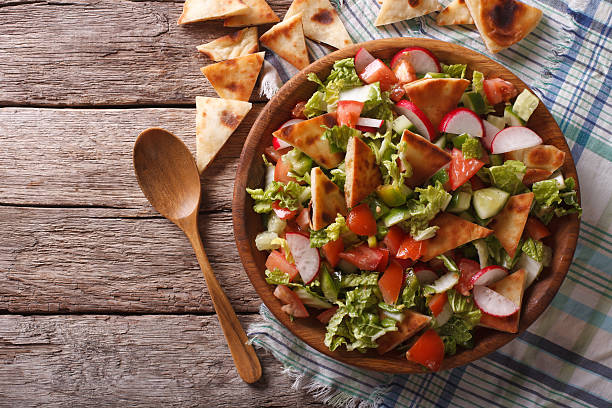 Traditional Arabic fattoush salad on a plate on the table